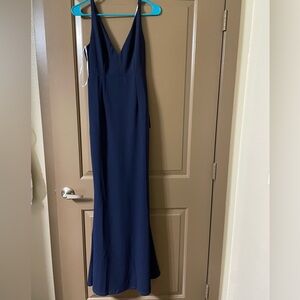 Lulu’s full length maxi dress in Navy Blue. Deep V neck back. Size small.